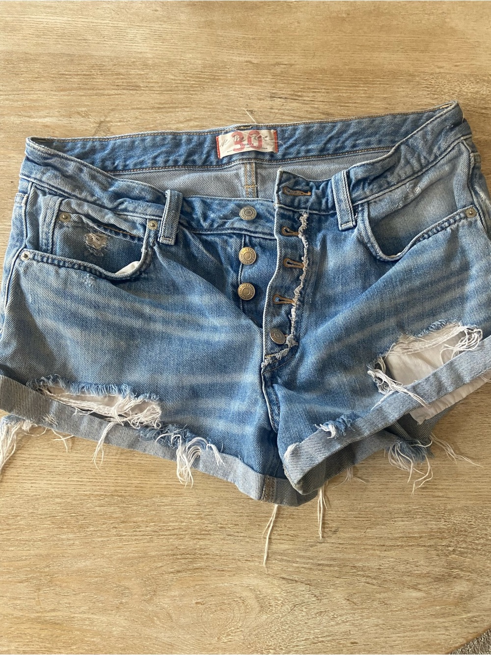 Lee Distressed Light Blue Denim Cutoff Women’s Shorts- Free People